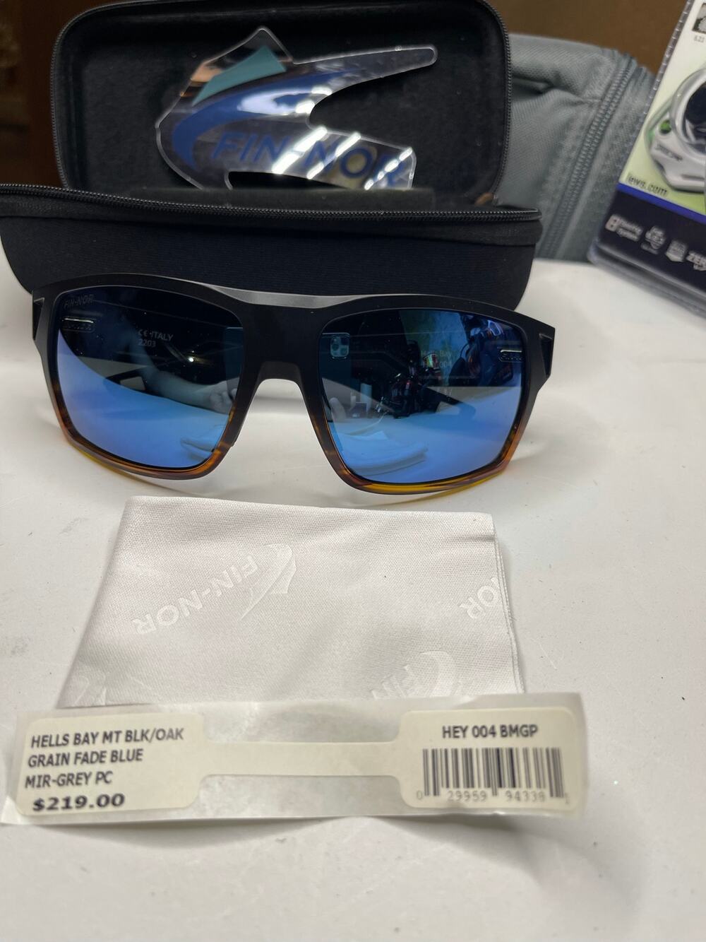 FIN NOR Hells Bay Matte Black/Oak Grain Fade Blue Mirror Polycarbonate Polarized